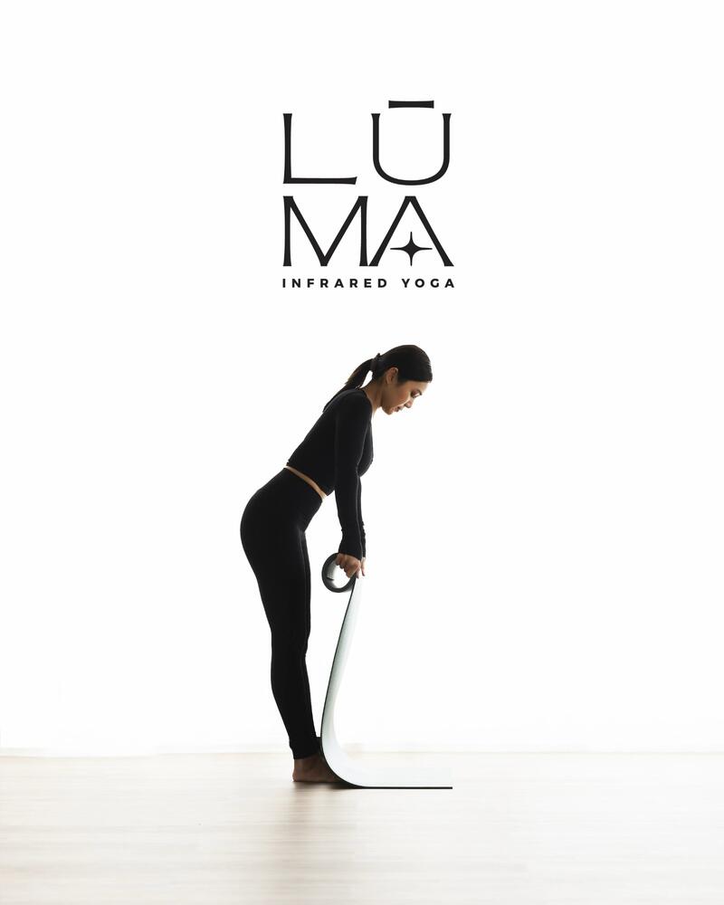 Yoga pose at LŪMA infrared studio Bangkok